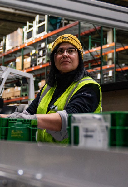 HODGE employee in warehouse logistics