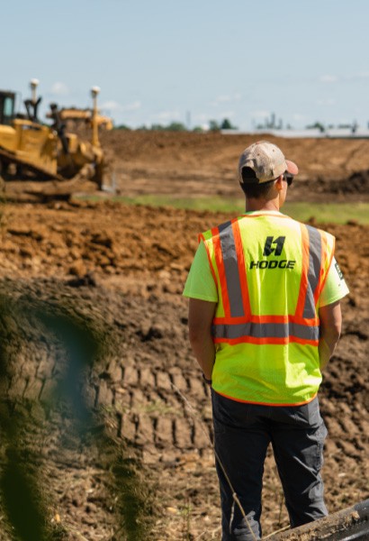 HODGE employee looking at real estate development