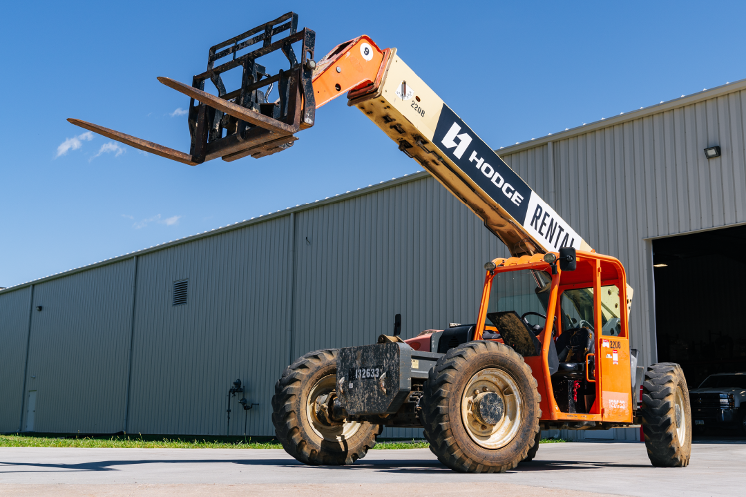 Service technician working on a forklift
